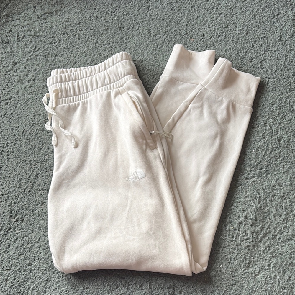 The North Face White Track Pants with Elastic Waistband and Tapered Legs